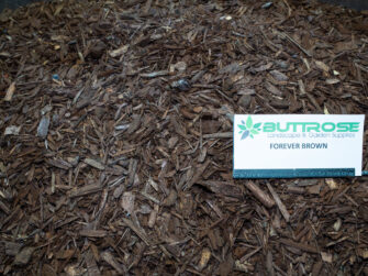 Forever Brown ground cover mulch with label